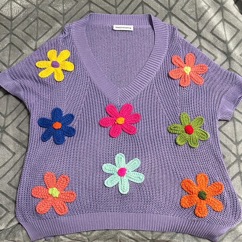 Vibrant Purple V-Neck Sweater with Floral Accents